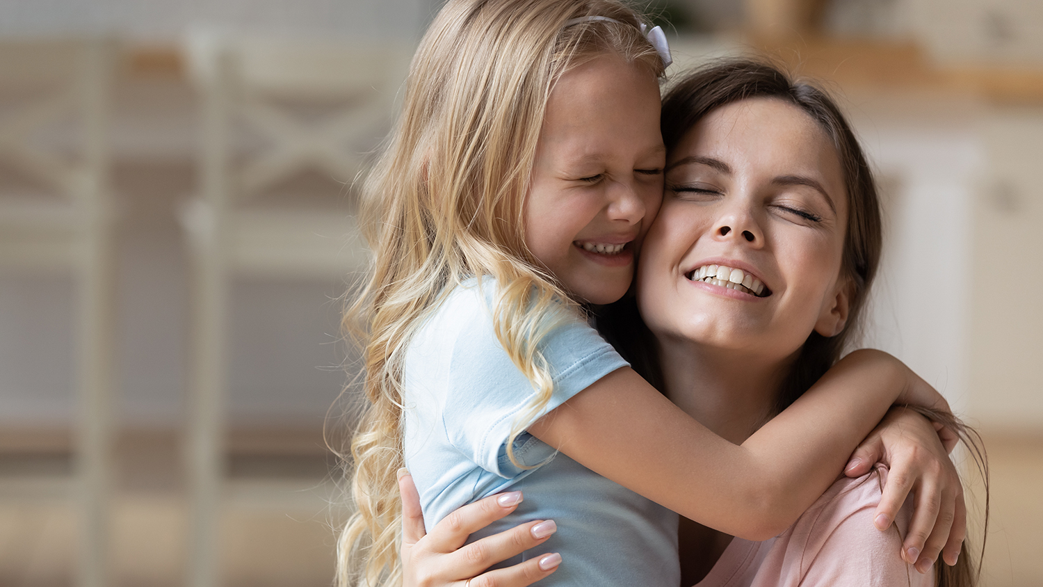 Mother and child hugging and smiling - Child Advocacy & Adoption Lawyer in Norristown, PA