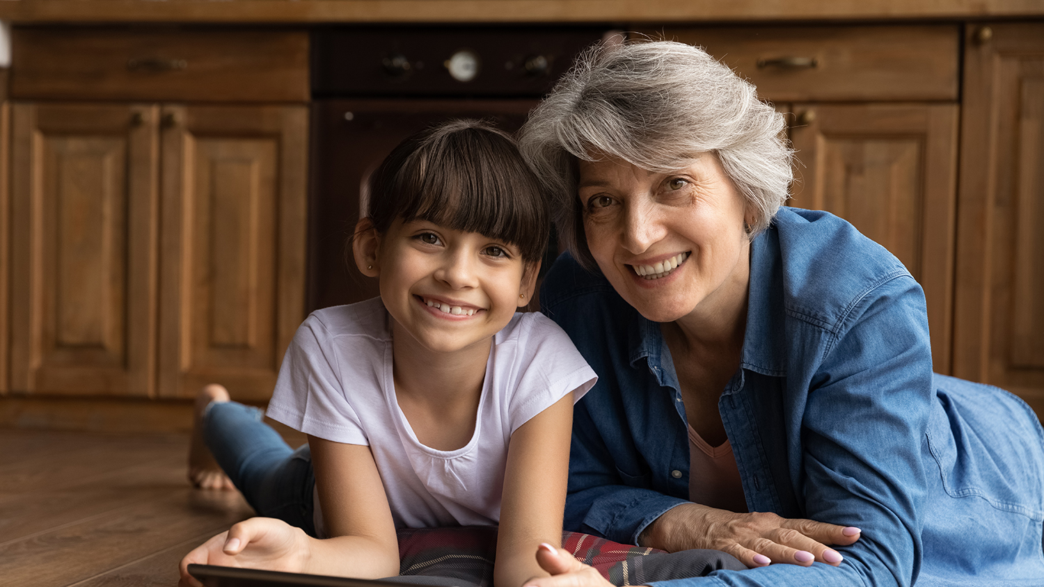 Grandmother and granddaughter smiling - Child Advocacy Lawyer at The Law Offices of Lisa Kane Brown